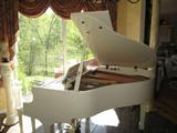 Ivory Gloss Baby Grand piano by Samick! Low mileage with snappy action!! Excellent condition! Comes with bench!