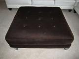 large tufted ottoman by Carter with rollers (you can take rolls off)
measures approximately 41'' W x 41'' D x 16'' H (H is with rollers on)