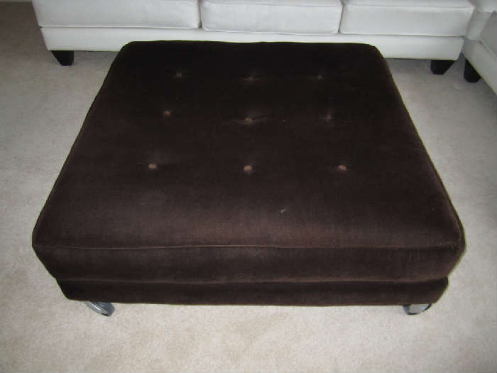 large tufted ottoman by Carter with rollers (you can take rolls off)
measures approximately 41'' W x 41'' D x 16'' H (H is with rollers on)