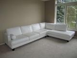 Carter white leather sectional
the right side of the sectional against the window measures approximately 90'' W measured on the back side from end to end
the left side of the sectional against the wall measures approximately 126'' W measured on the back side from end to end
asking $2000 or best offer