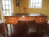 LEATHER COVERED, INLAID WOOD, BRONZE GOLD GILDED DESK WITH A FALSE FRONT FOR DETAIL.  DRAWERS THAT LOCK WITH KEY.  STUNNING!!!
