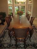Henredon Mahogany "Versailles" Collection dining set. Dining table, large buffet, 6 side chairs and 2 arm chairs. Includes table pads Large lighted buffet 92" height, 78" width and 20" depth Dining table 72" width 18"