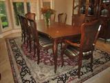 Henredon Mahogany "Versailles" Collection dining set. Dining table, large buffet, 6 side chairs and 2 arm chairs. Includes table pads Large lighted buffet 92" height, 78" width and 20" depth Dining table 72" width 18"