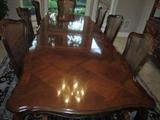Henredon Mahogany "Versailles" Collection dining set. Dining table, large buffet, 6 side chairs and 2 arm chairs. Includes table pads Large lighted buffet 92" height, 78" width and 20" depth Dining table 72" width 18"