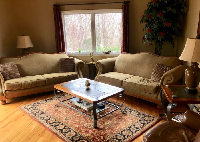 Pair upholstered sofas, Area rugs, tables & leather chair