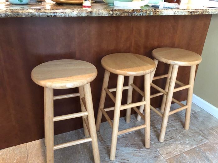 Five wood bar height stools