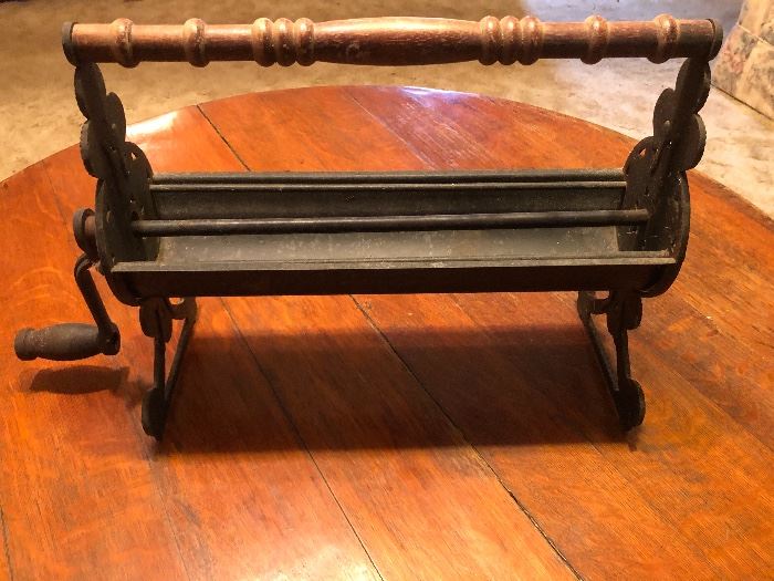 Vintage Cast Iron Newspaper Log Roller