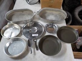 Lot of pans ,lids,ice scraper and bottel opener