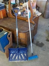 snow shovel and car wash brush