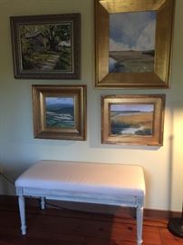 Original art graces almost every wall in this grand home.  