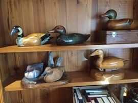 Duck decoys.  Two on bottom left are hand-carved by C. Ed Sutton