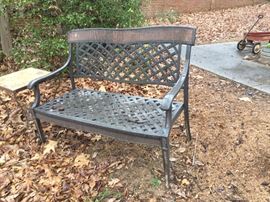 Beautiful metal garden bench.  There is a second bench just as nice as well.