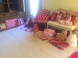 An entire room of pillow and lampshades.  