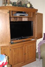 Television and Electronics are not for sale.  Just cabinet and upper decor