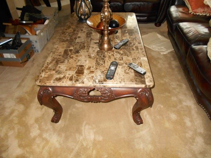 Low and large marble-top coffee table