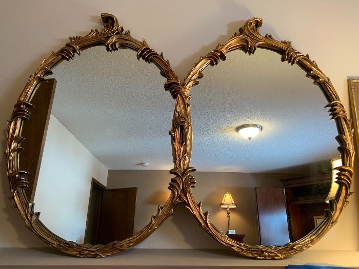 Large double oval gold gilt mirror.  58”W x 43”T