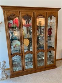 Very nice four door lit display cabinet
