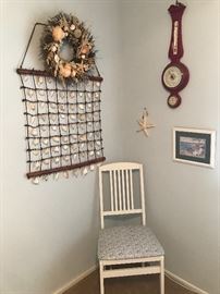 Shell wall hanging, wood chair, barometer