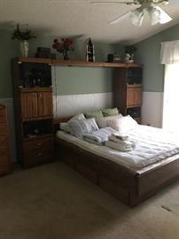 Bed and headboard. Side cabinets may be sold separately 