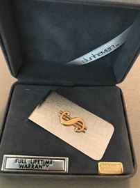 Dunhaven money clip. Rhodium finish. No warranty. 