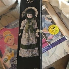 Porcelain doll. NIB