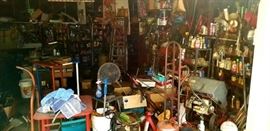 The art entitled "The Garage"....this is the before picture...before we have begun to set it up for next weeks sale. Of course, this is not what it will look like next weekend.