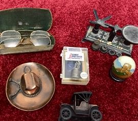 Antique glasses, mini cast iron scale, coy boy hat ashtray, pewter souvenir thimble, souvenir marble egg from China, vintage tin-lizzy sharpener