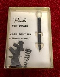Cast iron poodle pen holder with pen/rotary phone dialer combo