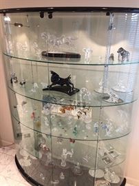 Contemporary Glass 4 Tier lighted curio 71" height x 60" width