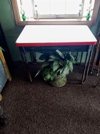 PORCELAIN TOP TABLE ....SOME RUST ON LEGS....GREAT GARDEN/POTTING TABLE