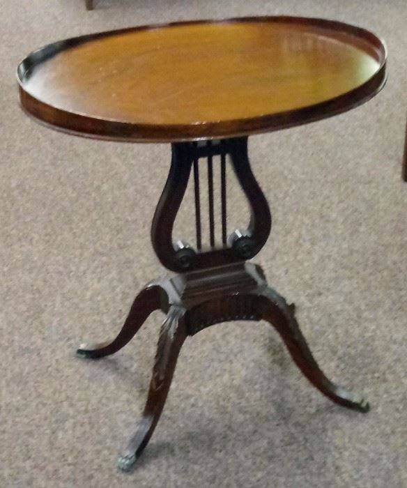     1940'S MERSMAN OVAL TABLE WITH LYRE/HARP BASE.
