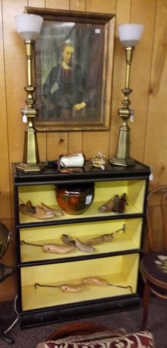 BOOK SHELVES WITH OLD WOODEN SHOE TREES