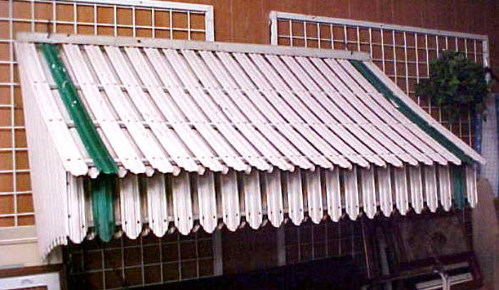 VINYL AWNING--THERE ARE 2 OF THESE