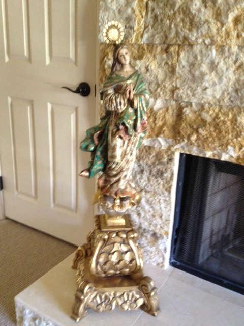 Gorgeous Sculpture of the Blessed Mother, Immaculate Conception by Augstin Parra 3 angels at her feet.  An exact replica of this was given to Pope John Paul II by Auguston Parra for the Vatican.  Wood with Gold Leaf. 3' High $5,000