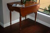 Gateleg table with interesting swivel base