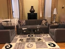 gray velvet sofa and chairs
Chairs sold