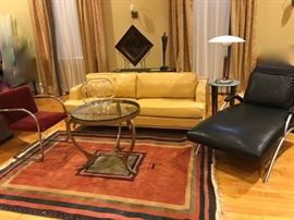 American Leather Co. yellow sofa, sold, round glass top metal tea table,-sold , Thayer Coggin, Milo Baughman limited edition chaise lounge 1/500
