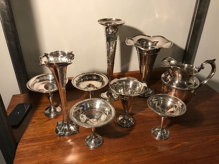 Sterling trumpet vases and compotes. 