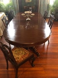 beautiful dining table and 6 Chippendale chairs, also can be 51” round table without leaves