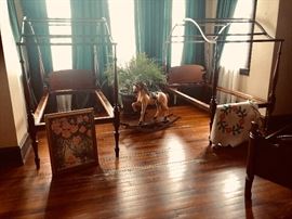 pair of twin tester beds. wooden rocking horse, hand made quilts