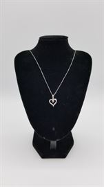 14K white gold heart pendant on a 14K white gold chain