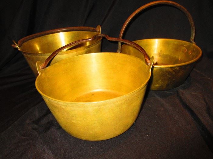 Group of antique brass kettles