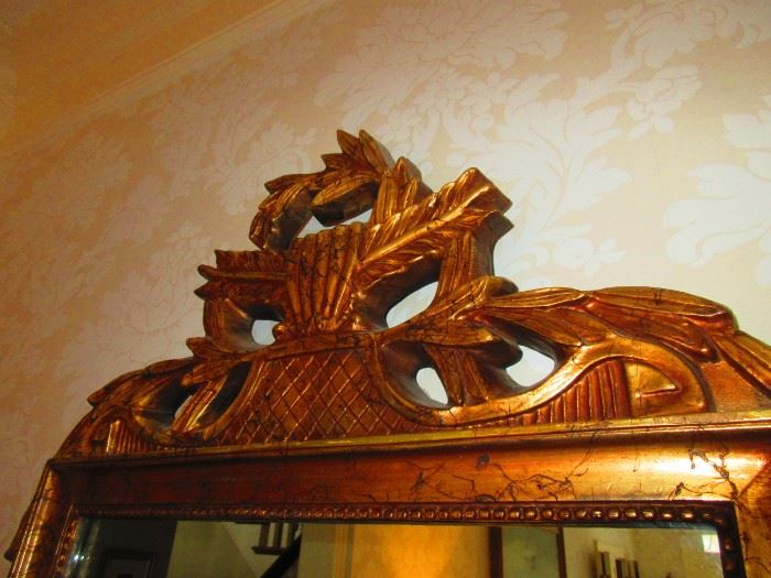 Detail of pediment of antique French mirror