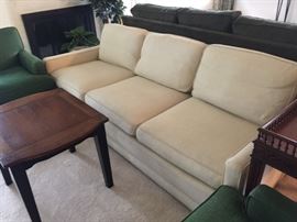 Classic, tailored mid-century sofa.  Off white.