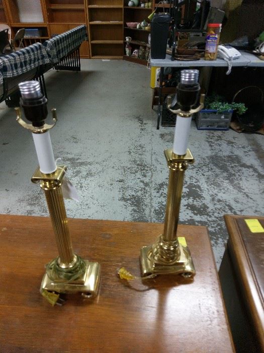 matching gold lamps that look like statues