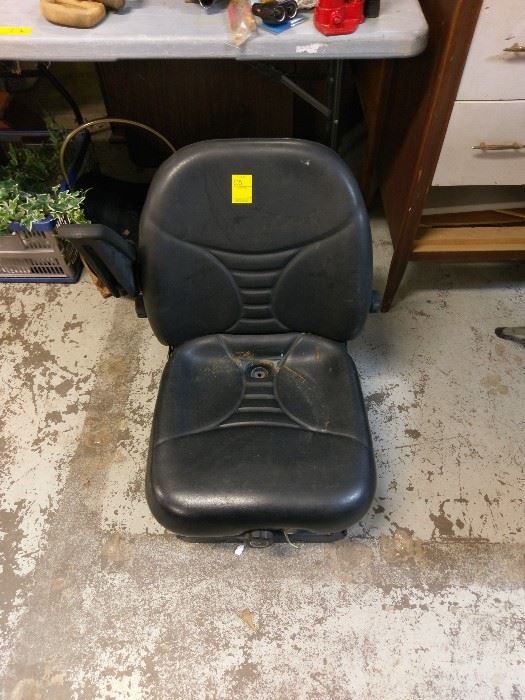equipment seat for tractor that will accommidate seat sensor.