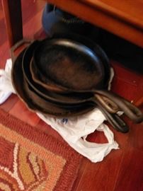 5 different pieces of cast iron cookware