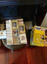 assorted hockey cards and figurines