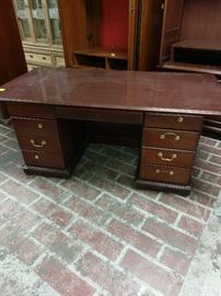 large office desk, 7 drawers with key.  does need handles
