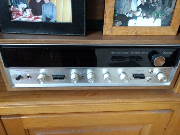 Sansui AM/FM stereo receiver model 5000A. From 1974 - 1976. Rated at 55 watts per channel into 8 ohms. Features, both tuning and signal meters, two tape in/outputs, one phono input, one aux input, high and low filters on/off, muting on/off, FM stereo only on/off, loudness on/off, reverse on/off, mono on/off, selectors - tape head - phono - AM - FM - FM auto - aux, front tape playback and record inputs, separate bass and treble tone controls.
